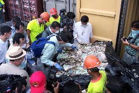 Japanese experts begin checking waste dumped in Manila
